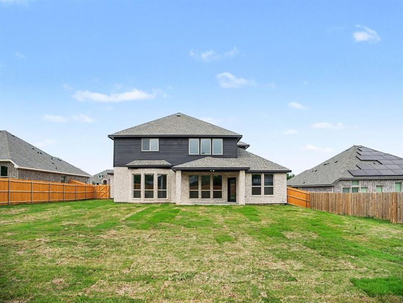 Exterior details and patio area of a home in Cole Crossing Estates, DeSoto (Image 17).