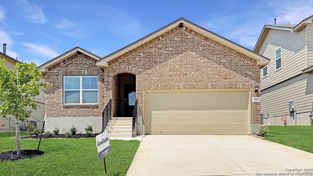 Front exterior of a new home in Redbird Ranch, San Antonio, TX, highlighting curb appeal (Image 22).