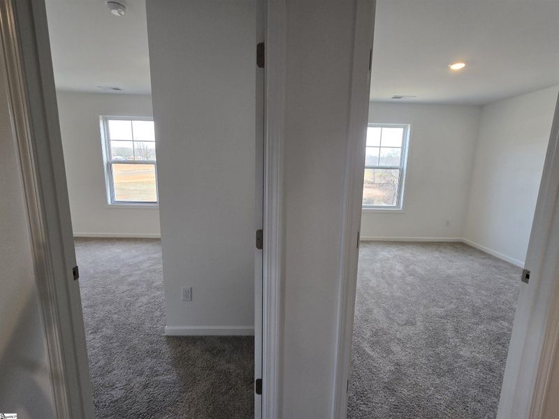 Spacious, unfurnished interior of a new home in Halton Oaks, Spartanburg (Image 27).