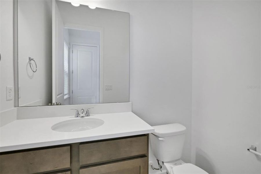 Furnished interior view inside a new home in Serenade at Ovation, Winter Garden (Image 8).