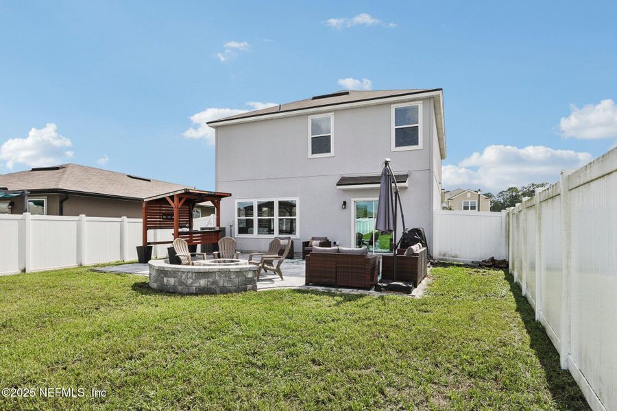 Front exterior of a new home in Cross Creek Express, Green Cove Springs, FL, highlighting curb appeal (Image 26).