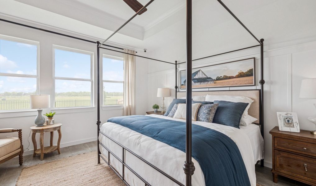 Primary suite with decorative feature wall