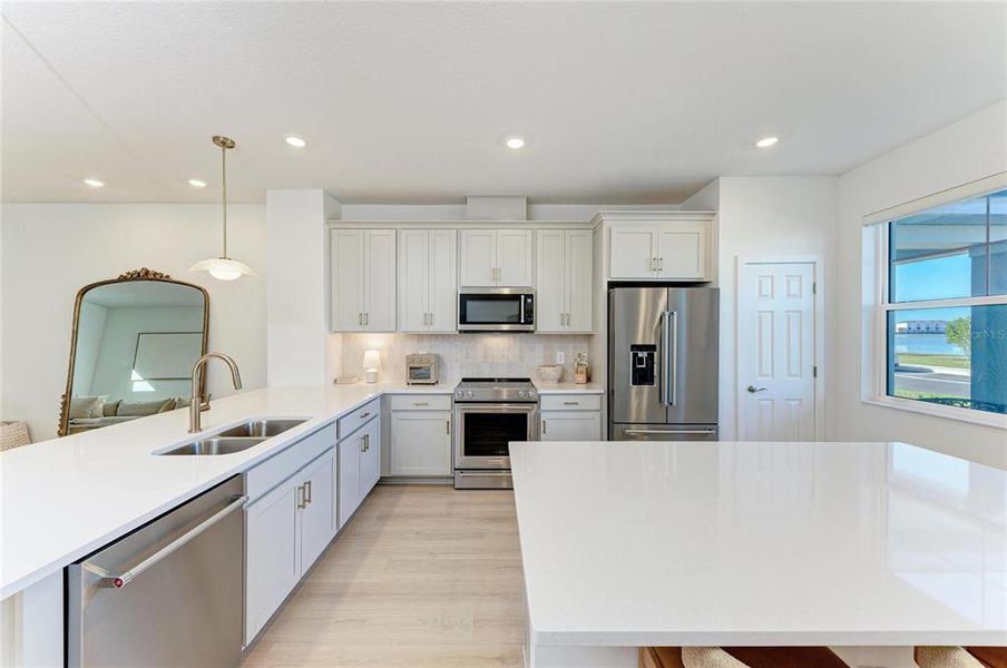 Furnished interior view inside a new home in Nautique at Waterside, Sarasota (Image 11).