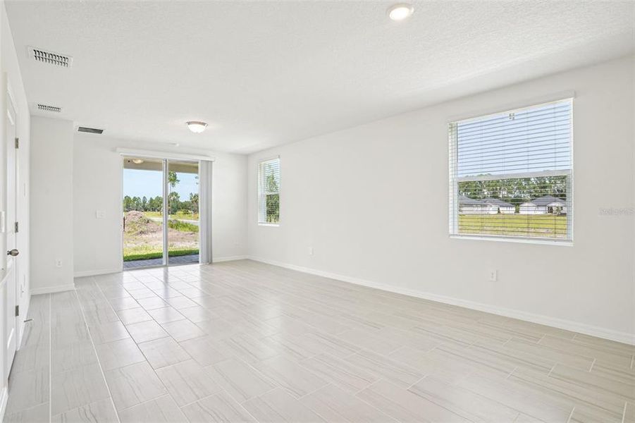Spacious, unfurnished interior of a new home in Ridgehaven - Villas, Ormond Beach (Image 14).