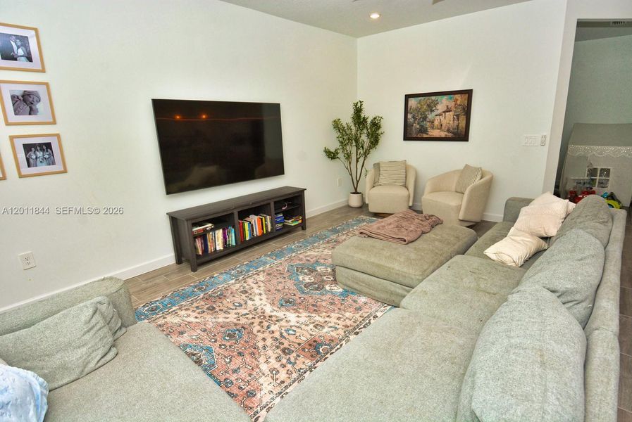 Furnished interior view inside a new home in Central Park, Port St. Lucie (Image 45).