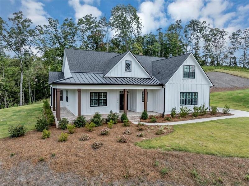Front exterior of a new home in , Ball Ground, GA, highlighting curb appeal (Image 24).