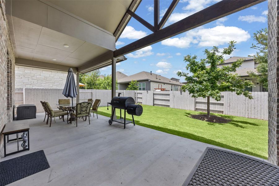 A spacious covered patio ; privacy fenced yard, ideal for outdoor entertaining. A spacious covered patio ; privacy fenced yard, ideal for outdoor entertaining.