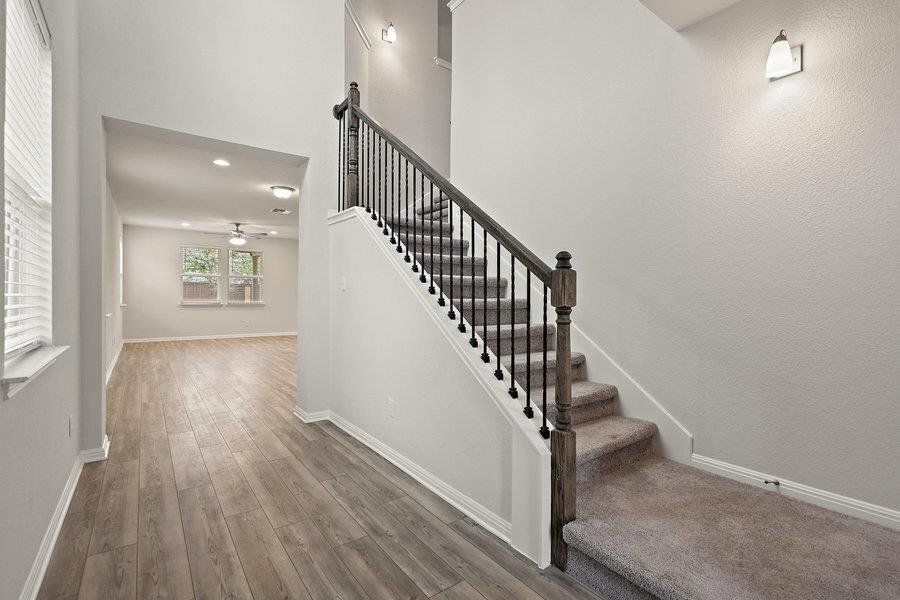 Photos are of a completed model of the same floor plan and are for illustrative purposes only. Actual home is under construction and design selections, materials, and features may differ. Confirm final specifications with the New Home Consultant.