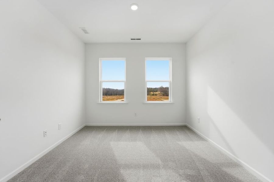 Spacious, unfurnished interior of a new home in Ridge at Sugar Creek, Indian Land (Image 13).