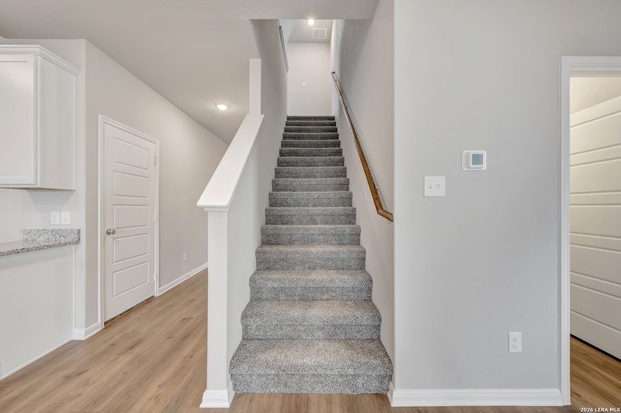 Spacious, unfurnished interior of a new home in Hunters Ranch, San Antonio (Image 40).