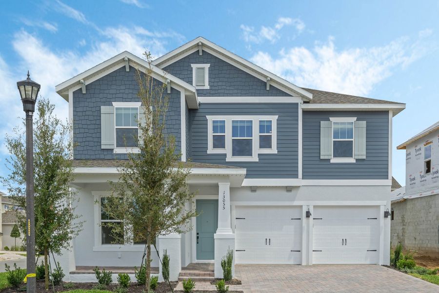 Representative exterior photo of a completed home built from the Faulkner by Rockwell Homes in Northlake at Ovation, Winter Garden, FL (Image 34). Representative exterior photo of a completed home built from the Faulkner by Rockwell Homes in Northlake at Ovation, Winter Garden, FL (Image 34).