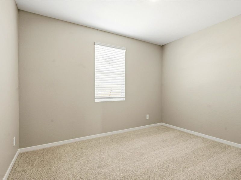 Spacious, unfurnished interior of a new home in White Tank Foothills Reserve Series, Waddell (Image 18).