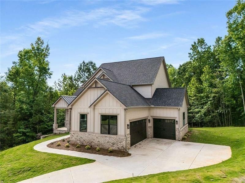 Front exterior of a new home in , Jefferson, GA, highlighting curb appeal (Image 28).