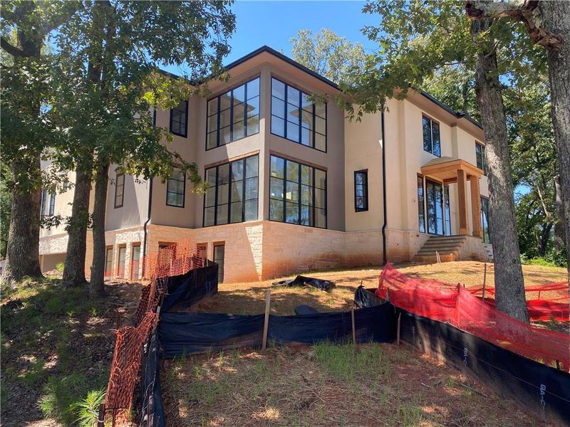 Front exterior of a new home in , Alpharetta, GA, highlighting curb appeal (Image 7).