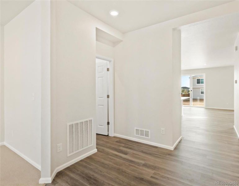 Spacious, unfurnished interior of a new home in Buffalo Highlands: The Flora Collection, Commerce City (Image 3).