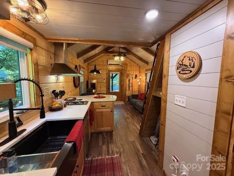 Kitchen area into the living room