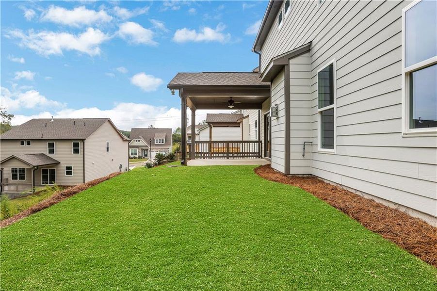 Exterior details and patio area of a home in Marble Tree, Ball Ground (Image 2).