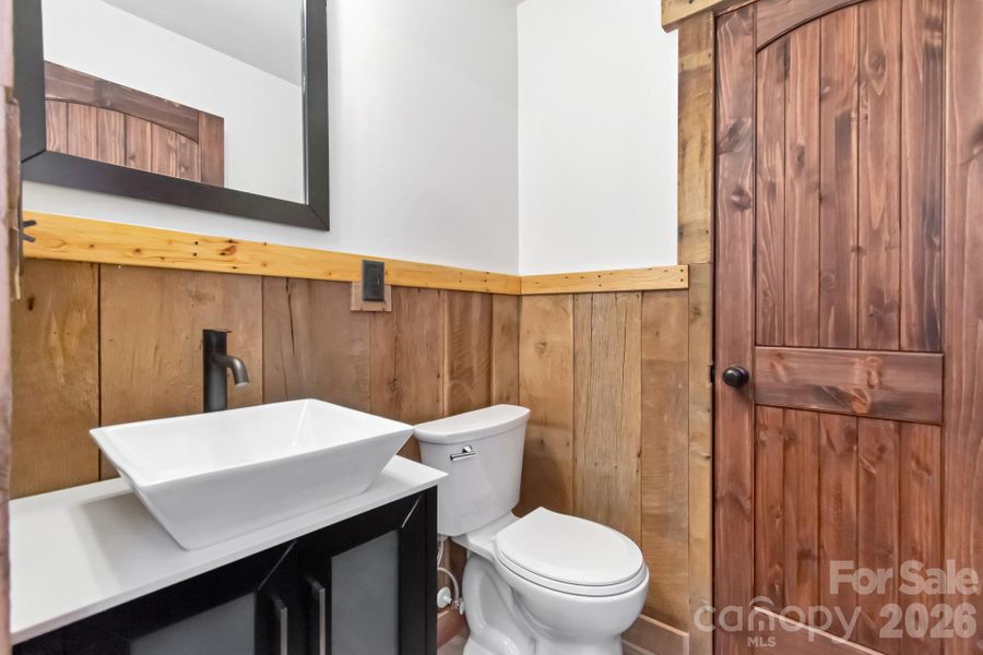 Main Level Guest Bathroom with Storage Closet