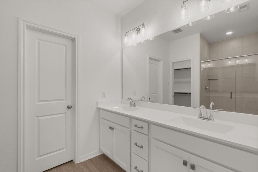 Representative furnished interior of a home built from the Chalet by Chesmar Homes in Woodforest, Montgomery (Image 5).