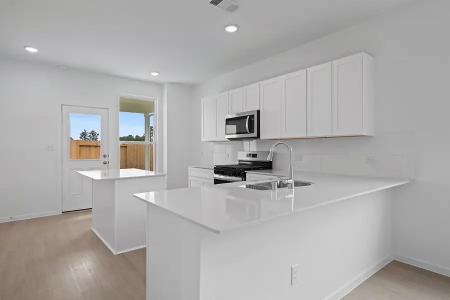 Furnished interior view inside a new home in Montgomery Bend, Montgomery (Image 7).