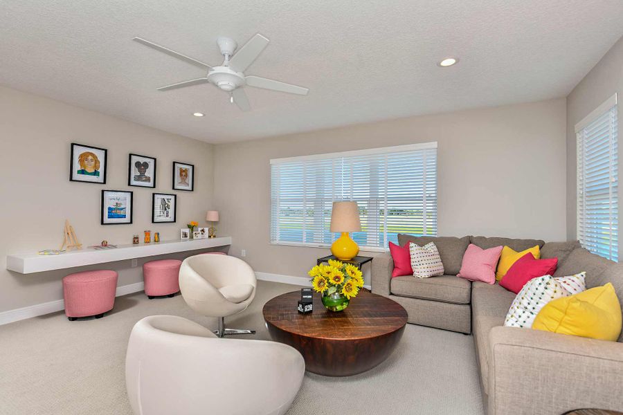 Representative furnished interior of a home built from the Triumph by Neal Communities in Grand Park, Sarasota (Image 15).