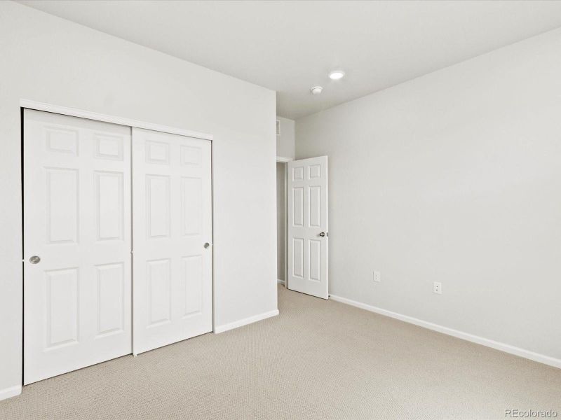 Spacious, unfurnished interior of a new home in Poudre Heights: The Alpine Collection, Windsor (Image 35).