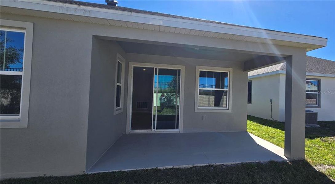 Exterior details and patio area of a home in Eden Hills, Lake Alfred (Image 2). Exterior details and patio area of a home in Eden Hills, Lake Alfred (Image 2).