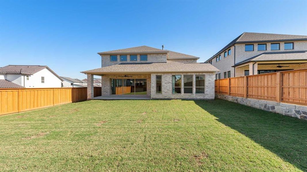 Exterior details and patio area of a home in Fields 50', Frisco (Image 3). Exterior details and patio area of a home in Fields 50', Frisco (Image 3).