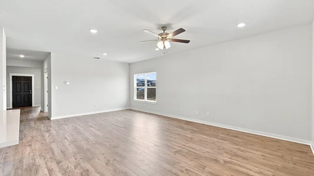 Furnished interior view inside a new home in Carillon, Manor (Image 24).