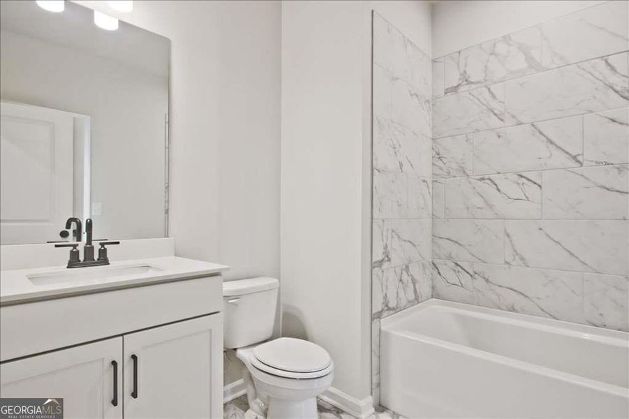 Furnished interior view inside a new home in The Paddocks at Doc Hughes, Buford (Image 17).