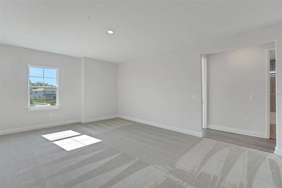Spacious, unfurnished interior of a new home in Palms at Windermere, Windermere (Image 32).