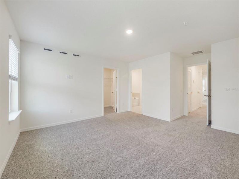 Spacious, unfurnished interior of a new home in Towns at Riverwalk, Sanford (Image 20). Spacious, unfurnished interior of a new home in Towns at Riverwalk, Sanford (Image 20).