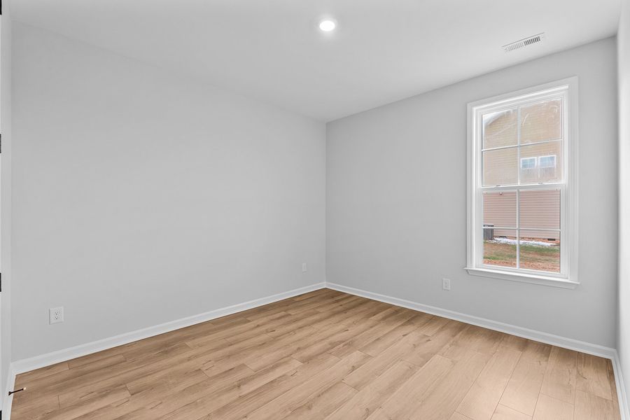 Spacious, unfurnished interior of a new home in Lilah Grove, Summerfield (Image 30).