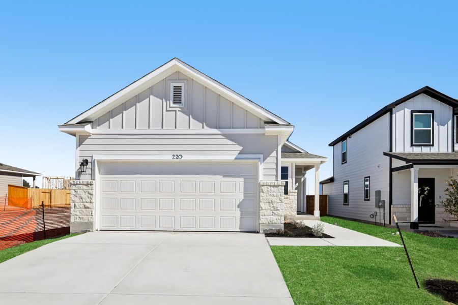 Front exterior of a new home in Eastwood at Sonterra, Jarrell, TX, highlighting curb appeal (Image 1). Front exterior of a new home in Eastwood at Sonterra, Jarrell, TX, highlighting curb appeal (Image 1).