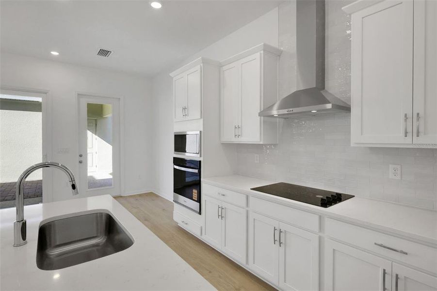 Furnished interior view inside a new home in Serenade at Ovation, Winter Garden (Image 13).