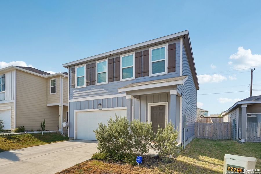 Front exterior of a new home in Sutton Farms, San Antonio, TX, highlighting curb appeal (Image 25). Front exterior of a new home in Sutton Farms, San Antonio, TX, highlighting curb appeal (Image 25).