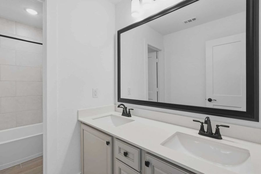 Representative furnished interior of a home built from the Emma by Chesmar Homes in Bridgeland, Elgin (Image 9).