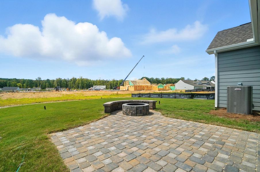 Front exterior of a new home in Heritage - 55+ Community, Indian Trail, NC, highlighting curb appeal (Image 31). Front exterior of a new home in Heritage - 55+ Community, Indian Trail, NC, highlighting curb appeal (Image 31).