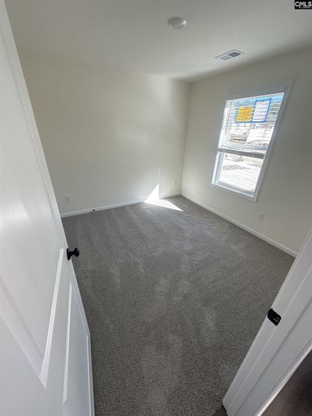 Spacious, unfurnished interior of a new home in Piney Woods Bluff, Columbia (Image 10).