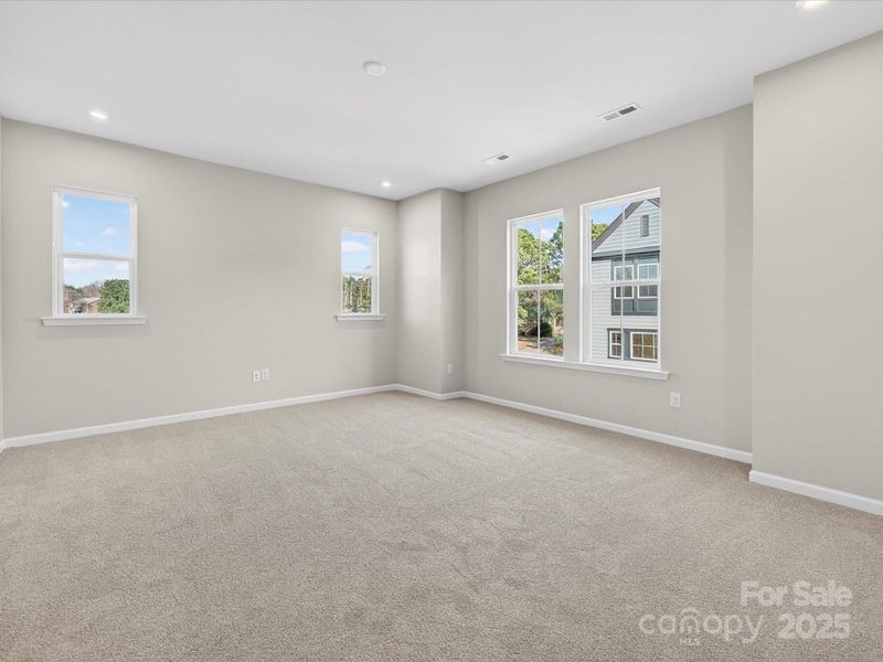 Primary Suite Warmed by Natural Light.