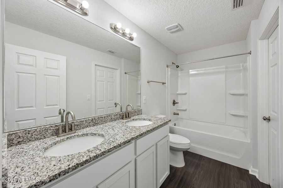 Furnished interior view inside a new home in , Jacksonville (Image 7). Furnished interior view inside a new home in , Jacksonville (Image 7).