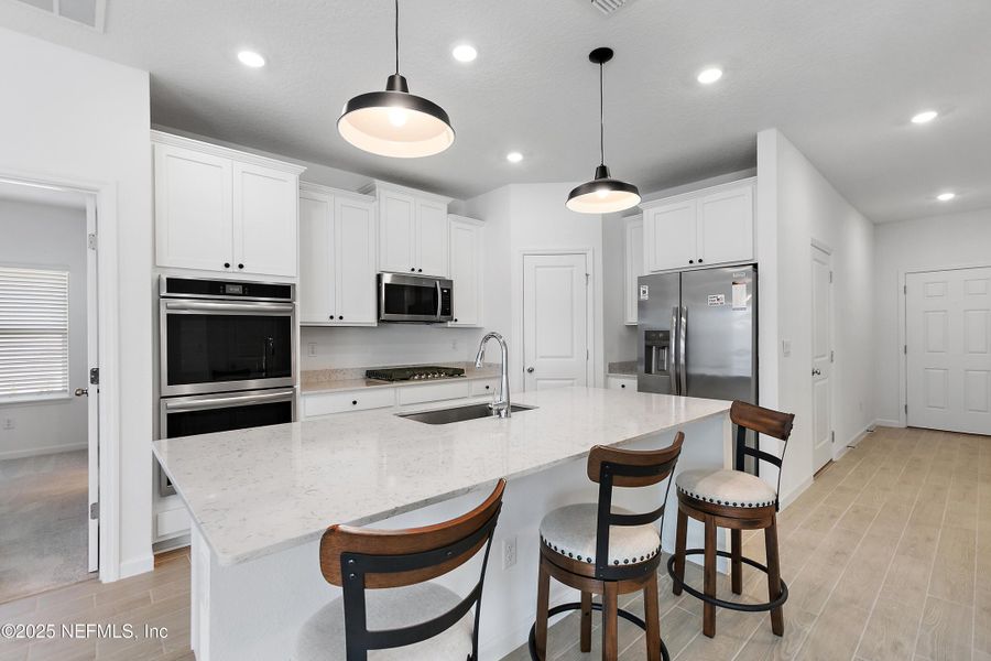 Furnished interior view inside a new home in Tributary: Lakeview at Tributary 50's, Yulee (Image 7).