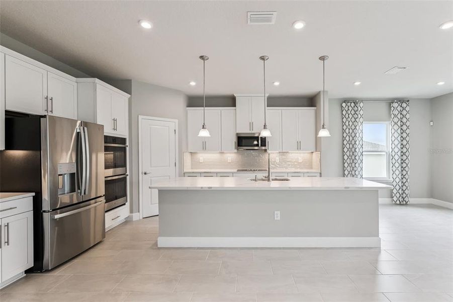 Furnished interior view inside a new home in Bella Terra, Clermont (Image 13). Furnished interior view inside a new home in Bella Terra, Clermont (Image 13).