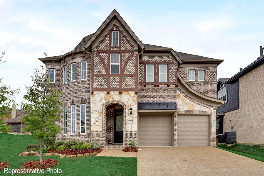 Representative exterior photo of a completed home built from the Grand Heritage by Grand Homes in Grand Oaks, Celina, TX (Image 19).