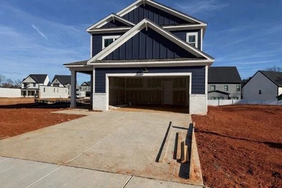 Exterior featuring the AW Collection® Serene - Earthy tones and clean lines feel quietly inviting.