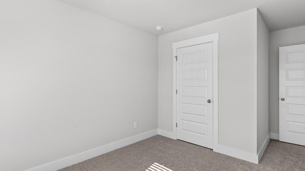 Spacious, unfurnished interior of a new home in The Haven at Indigo Preserve, Leland (Image 34).