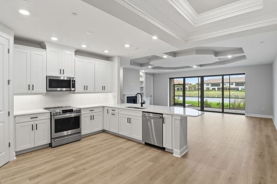 Furnished interior view inside a new home in Esplanade by the Islands Coach Homes, Naples (Image 7).