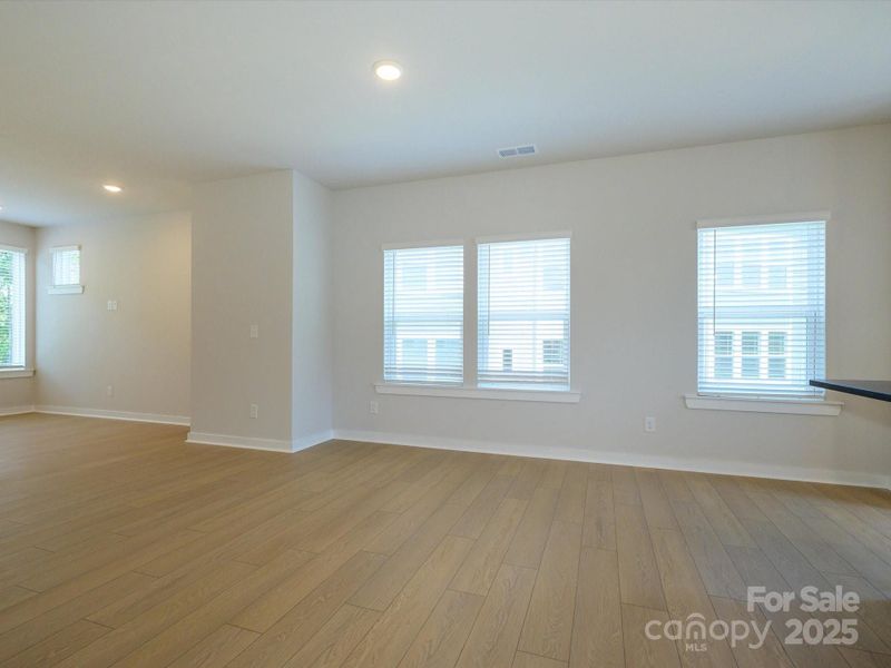 Spacious, unfurnished interior of a new home in Central Living at Craig, Charlotte (Image 23).