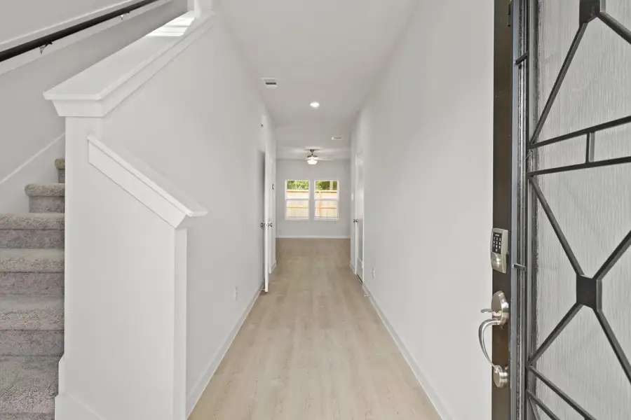 Spacious, unfurnished interior of a new home in Lakes at Black Oak, Magnolia (Image 13).