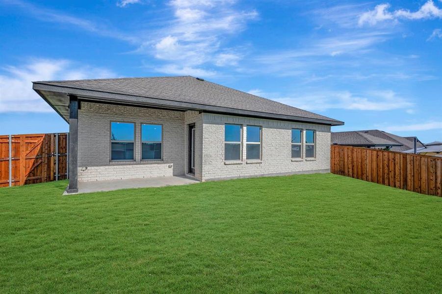 Exterior details and patio area of a home in Aspire at Noble Ridge, Howe (Image 2).